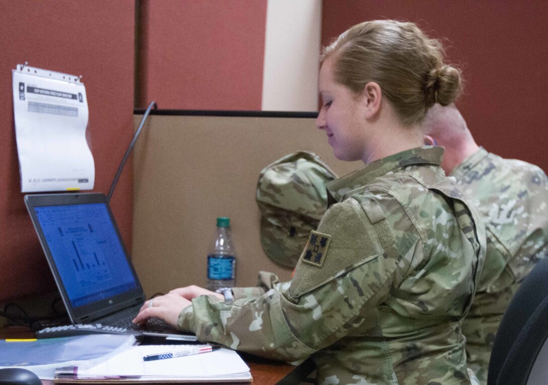 2nd Lt. Shelby Philips, a human resource officer assigned to 4th Sustainment Brigade, 4th Infantry Division (Mechanized) Fort Carson, Colorado, prepares for orders to respond to a nuclear explosion scenario during the annual Vibrant Response exercise at Camp Atterbury, Indiana, May 1, 2016. The training scenario provides a realistic operational environment using constructive simulations and response cells including military and civilian response units.