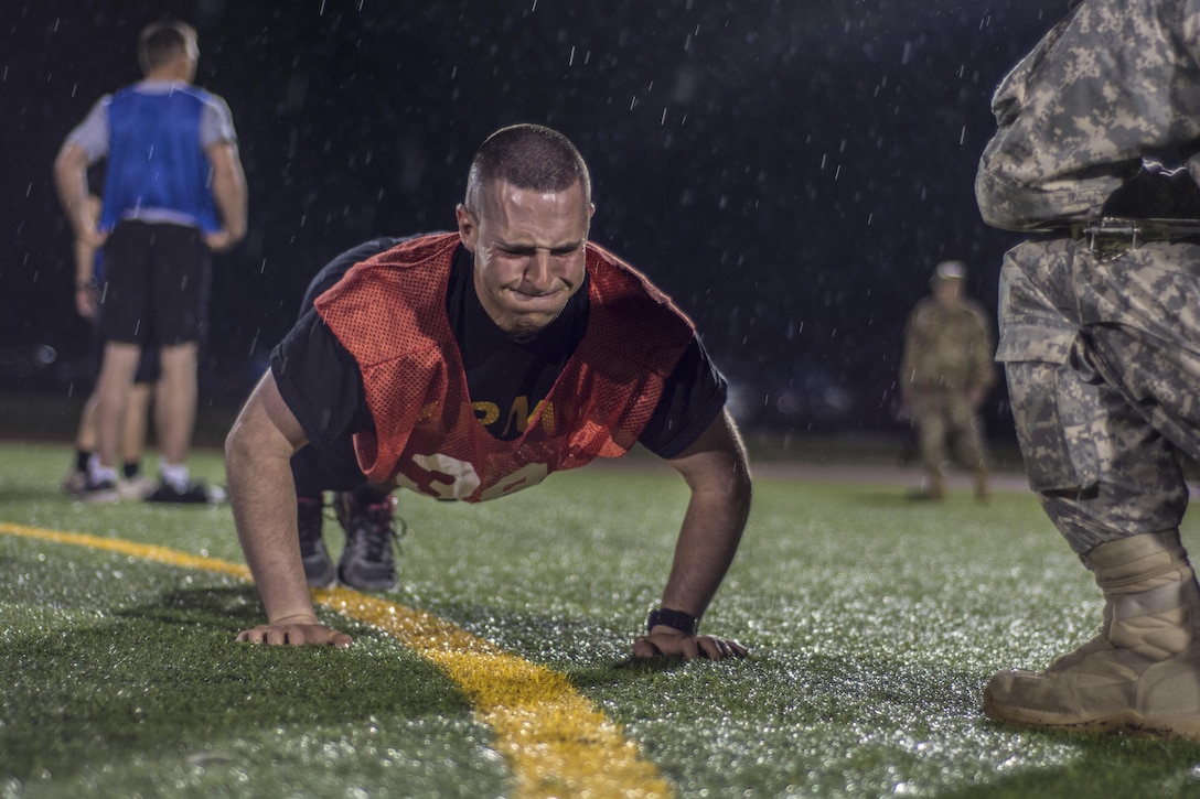 Soldiers began a rainy, first full day of competition at the 2016 U.S. Army Reserve Best Warrior Competition with the Army Physical Fitness Test at Hendrick Stadium on Fort Bragg, N.C., May 3. This year’s Best Warrior Competition will determine the top noncommissioned officer and junior enlisted Soldier who will represent the U.S. Army Reserve in the Department of the Army Best Warrior Competition later this year at Fort A.P. Hill, Va.  (U.S. Army photo Sgt. 1st Class Brian Hamilton/released)