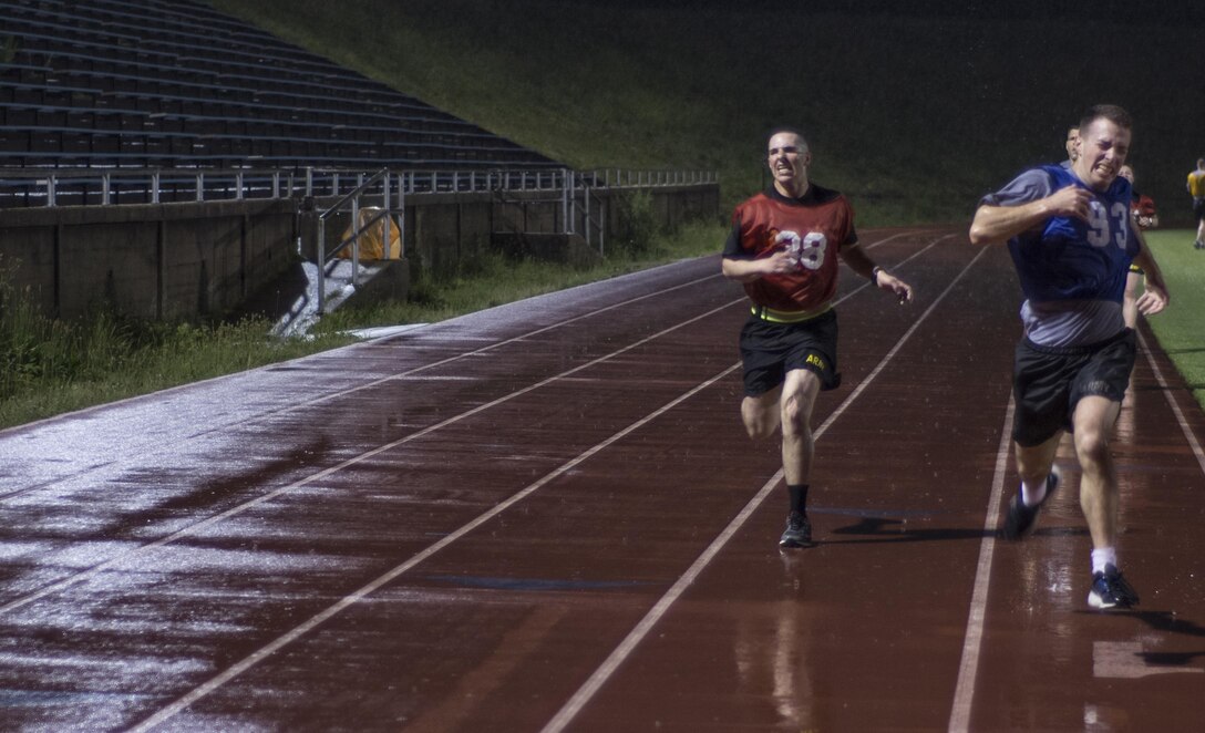 Soldiers competing at the 2016 U.S. Army Reserve Best Warrior Competition at Fort Bragg, N.C. sprint to the finish line during the 2-mile run event of the Army Physical Fitness Test, May 3. This year’s Best Warrior Competition will determine the top noncommissioned officer and junior enlisted Soldier who will represent the U.S. Army Reserve in the Department of the Army Best Warrior Competition later this year at Fort A.P. Hill, Va.  (U.S. Army photo Sgt. 1st Class Brian Hamilton/released)