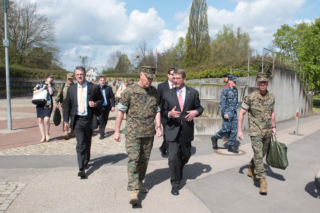 Defense Secretary Ash Carter and Marine Corps Gen. Joe Dunford, chairman of the Joint Chiefs of Staff, talk after participating in the change-of-command ceremony for U.S. European Command in Stuttgart, Germany, May 3, 2016. DoD photo by D. Myles Cullen