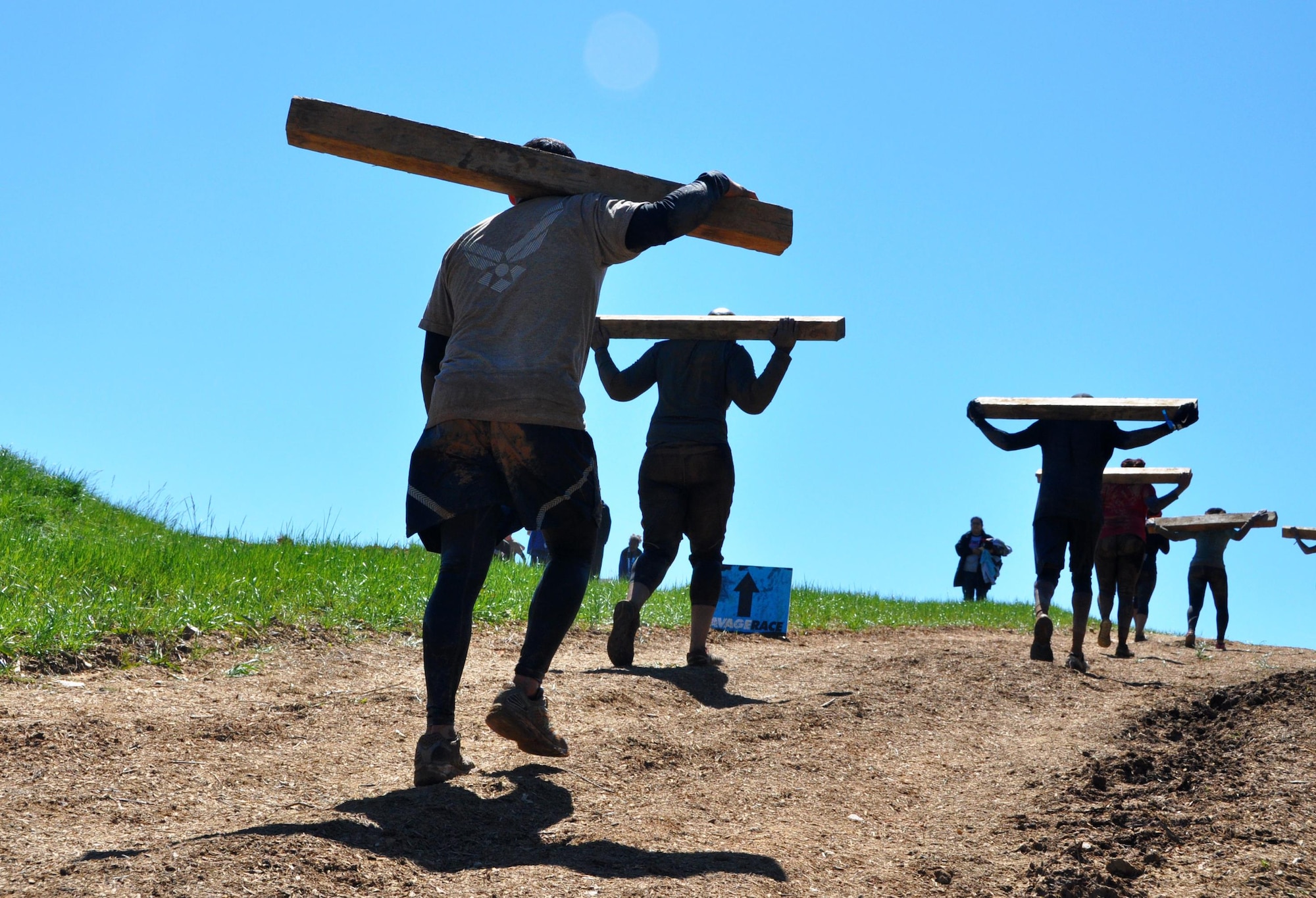 Technical Sgt. Randy Estrella, 94th Logistics Readiness Squadron vehicle maintenance specialist, took up the rear in Lumberjack Lane when Team Dobbins participated in the Savage Race on April 9, 2016 in Dallas, Georgia. Dobbins team members stayed close and encouraged one another throughout the course. (U.S. Air Force photo by Senior Airman Lauren Douglas)