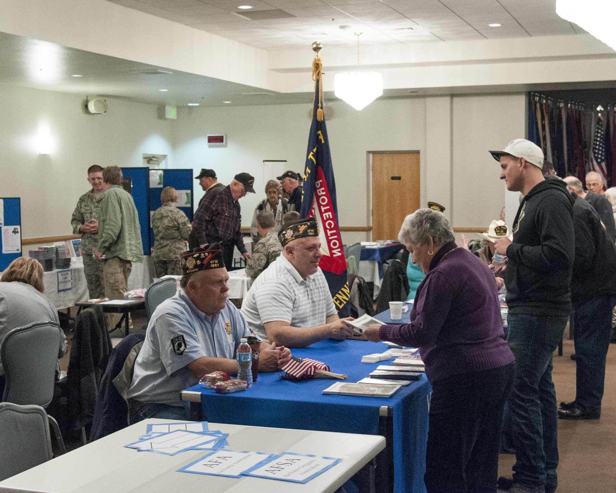 Military retirees, loved ones, community organization representatives and Airmen meet and share information with one another during Retiree Appreciation Day on F.E. Warren Air Force Base, Wyo., April 30, 2016. More than 150 guests attended the event and learned more about their retiree benefits. (U.S. Air Force photo by Senior Airman Jason Wiese)