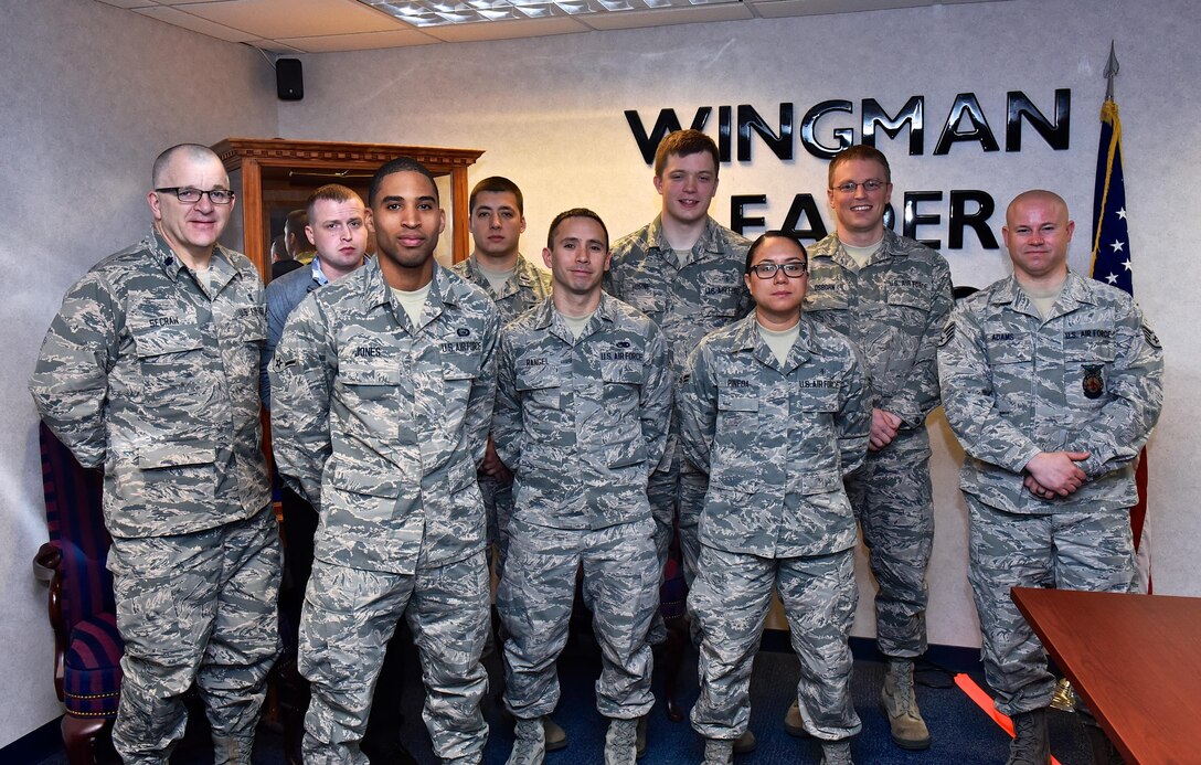 The April Unit Training Assembly Newcomers group gathers for a quick photo during their introduction to the 932nd Airlift Wing at Scott Air Force Base, Illinois.  The orientation allows the newest unit members to meet the commander and key leaders of the Air Force Reserve Command's only C-40C flying unit in Illinois.  (U.S. Air Force photo by Tech. Sgt. Christopher Parr)