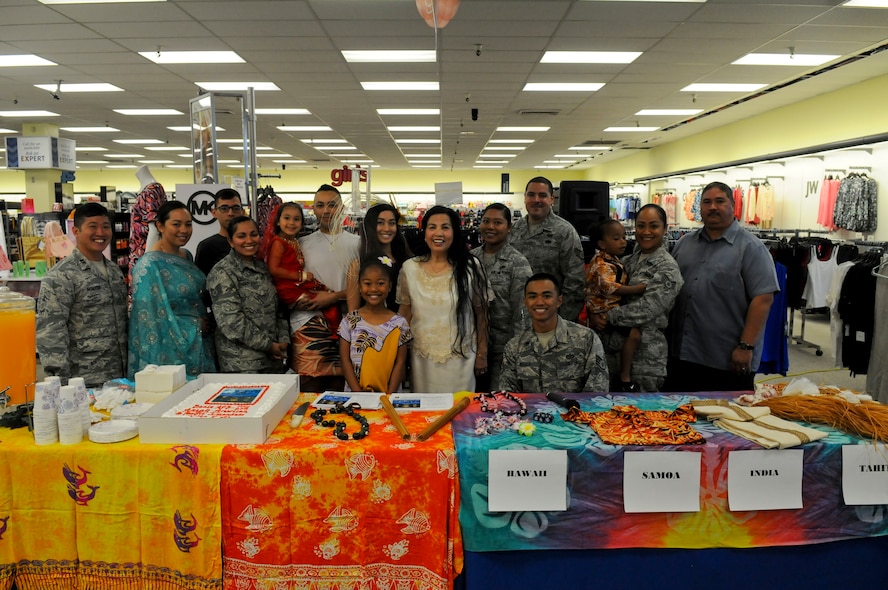 Beale’s Asian American Pacific Islanders Heritage (AAPIH) Month committee members pose for a photo during a cake cutting ceremony at Beale Air Force Base, California, May 2, 2016. The celebration was to kick-off (AAPIH) Month events. (U.S. Air Force photo by Senior Airman Michael Hunsaker)