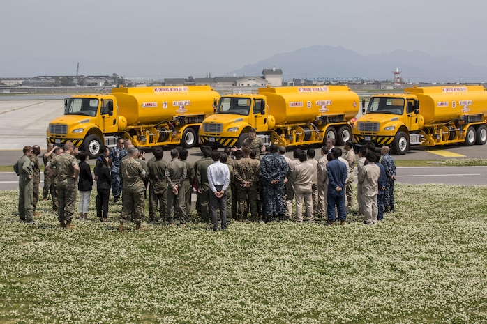 Flight line fuel operations with Headquarters and Headquarters Squadron receive the American Petroleum Institute Award on Marine Corps Air Station Iwakuni, Japan, May 2, 2016. The award –presented by Col. Robert V. Boucher, commanding officer of MCAS Iwakuni, on behalf of the Naval Systems Supply Command- recognizes the most outstanding fuel facility in the Marine Corps. (U.S. Marine Corps photo by Cpl. Nathan Wicks/Released)
