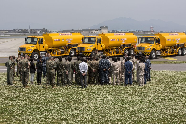Flight line fuel operations with Headquarters and Headquarters Squadron receive the American Petroleum Institute Award on Marine Corps Air Station Iwakuni, Japan, May 2, 2016. The award –presented by Col. Robert V. Boucher, commanding officer of MCAS Iwakuni, on behalf of the Naval Systems Supply Command- recognizes the most outstanding fuel facility in the Marine Corps. (U.S. Marine Corps photo by Cpl. Nathan Wicks/Released)