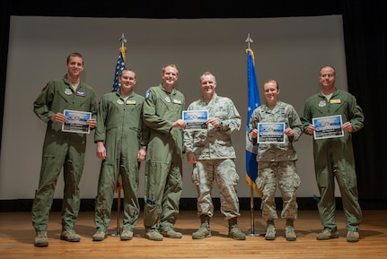 Airmen from the 437th Airlift Wing pose for a photo after being recognized with safety awards April 27, 2016, at Joint Base Charleston, S.C. The winners were recognized for the outstanding performance and their dedication to ensuring a safe environment while performing their duties. (U.S. Air Force photo/Staff Sgt. Jared Trimarchi) 