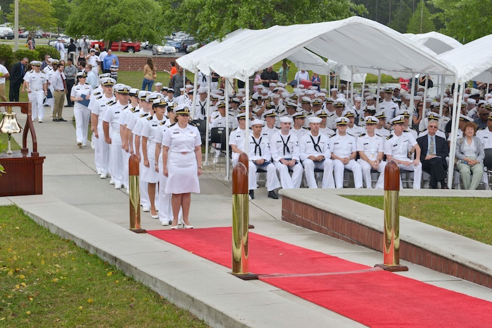Officer students line up in preparation for the graduation ceremony of Nuclear Power School class 1601 at Naval Nuclear Power Training Command (NNPTC) on April 22, 2016. Based at Joint Base Charleston-Naval Weapons Station, NNPTC trains Sailors in the fundamentals of design, operation, and maintenance of shipboard nuclear propulsion plants. (U.S. Navy Photo by Mass Communication Specialist 2nd Class Corey Dill)