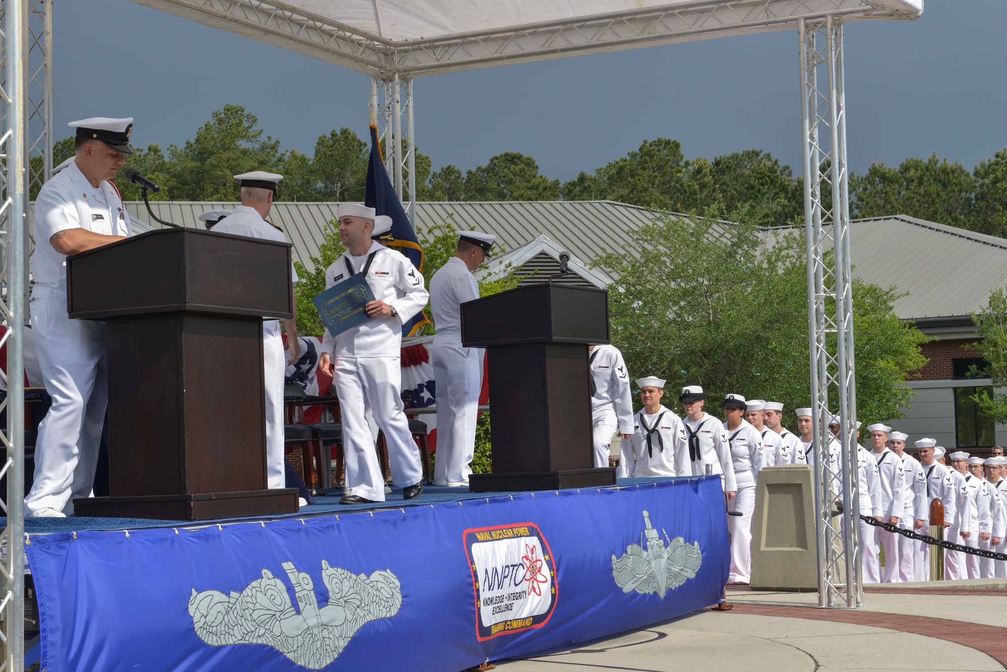 Sailors participate in the graduation ceremony of Nuclear Power School class 1601 at Naval Nuclear Power Training Command (NNPTC) on April 22, 2016. Based at Joint Base Charleston-Naval Weapons Station, NNPTC trains Sailors in the fundamentals of design, operation, and maintenance of shipboard nuclear propulsion plants. (U.S. Navy Photo by Mass Communication Specialist 2nd Class Corey Dill)