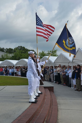 )- Sailors present colors during the graduation ceremony of Nuclear Power School class 1601 at Naval Nuclear Power Training Command (NNPTC) on April 22, 2016. Based at Joint Base Charleston-Naval Weapons Station, NNPTC trains Sailors in the fundamentals of design, operation, and maintenance of shipboard nuclear propulsion plants. (U.S. Navy Photo by Mass Communication Specialist 2nd Class Corey Dill)
