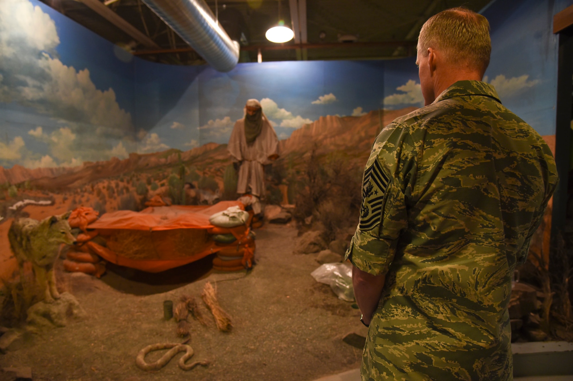 Chief Master Sgt. of the Air Force James A. Cody participates in an accelerated version of the 336th Training Group’s Survival, Evasion, Resistance and Escape classroom course May 2, 2016, at Fairchild Air Force Base, Wash. Airmen with the 336th TRG provided Cody with shelter, sustenance and other basic survival techniques for various types of environment. (U.S. Air Force photo/Airman 1st Class Mackenzie Richardson)