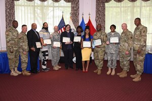 Fort Eustis and U.S. Army Training and Doctrine Command leadership poses with Volunteer of the Year Award winners for a photo at an awards ceremony at Fort Eustis, Va., April 25, 2016. The ceremony recognized winners and nominees for their volunteer contributions to the Army and on and off-post communities. (U.S. Army photo by Rodney E. Speed)
