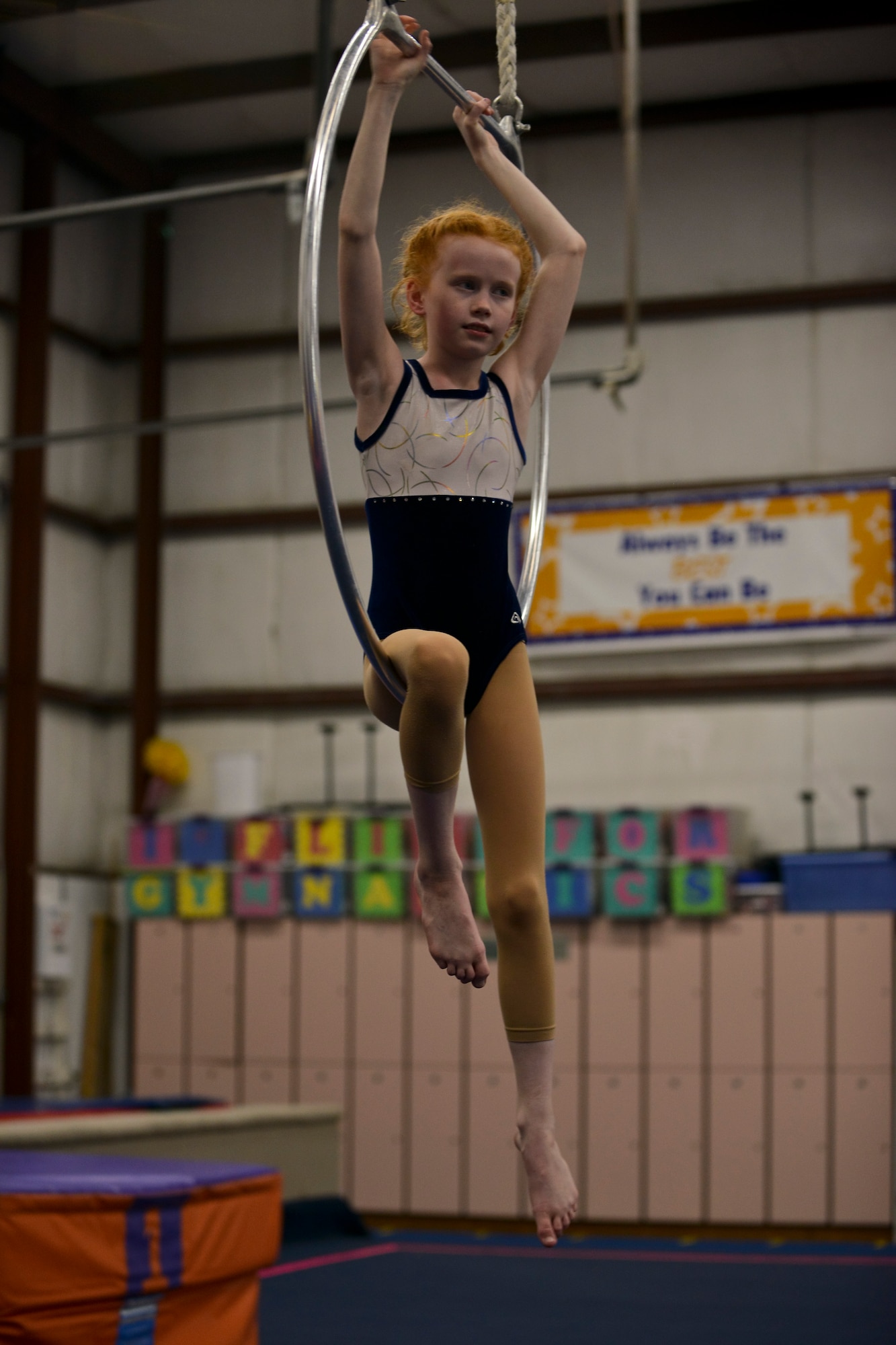 Ally Aspen, a Fort Eustis military child, listens to her aerial acrobatics coach critique her performance during a practice session in Hampton, Va., April 12, 2016. Ally not only practices every day, but keeps her grades in school up in order to reach her goal of joining Circus de Soleil. (U.S. Air Force photo by Staff Sgt. Natasha Stannard)