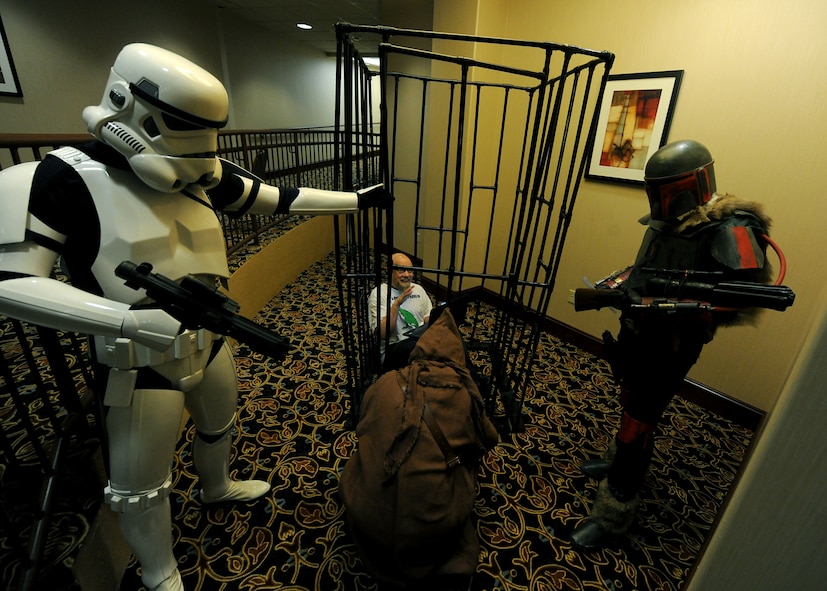 Several members from the local community dressed up in pop culture costumes at iMagicon at Minot, N.D. Apr. 23, 2016. iMagicon is a comic book convention that showcases local filmmakers, local businesses and promotes anything pop culture, several Airmen from Minot Air Force Base volunteered during the 3 day event. (U.S. Air Force photo by Staff Sgt. Chad Trujillo)
