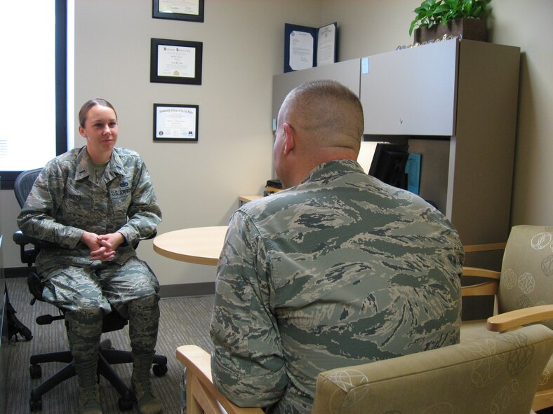 Maj. Thomas Smith, Mental Health Flight clinical training director and 1st Lt. Crystal Ditto, clinical social worker demonstrate a counseling session in the Mental Health Flight, located in the Wright-Patterson Medical Center. 
(U.S. Air Force photo / Kimberly Gaither)