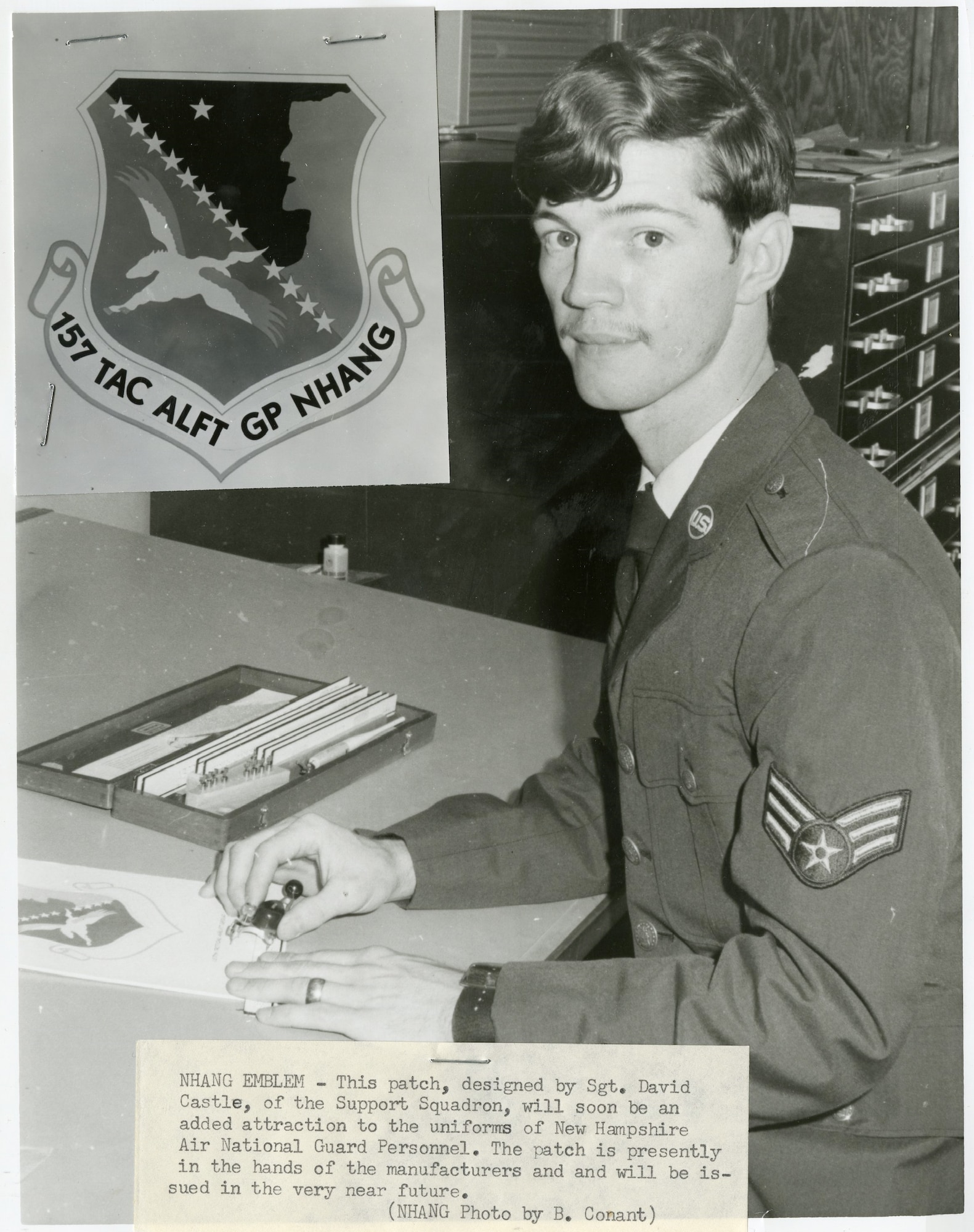 Sergeant David A. Castle of the Support Squadron designed the emblem for the 157th Tactical Airlift Group, New Hampshire Air National Guard.  The emblem became official on Aug. 23, 1972.  (U.S. Air National Guard photo by B. Conant) 