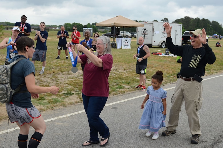 Long-distance runners support Military Appreciation Month by competing in the inaugural YMCA-Sumter Base-2-Base Race, May 1, 2016. The 21-mile race began at the front gate of McEntire Joint National Guard Base with the finish line at Shaw Park, near Shaw Air Force Base. (U.S. Air National Guard photo by Senior Master Sgt. Edward E. Snyder)

