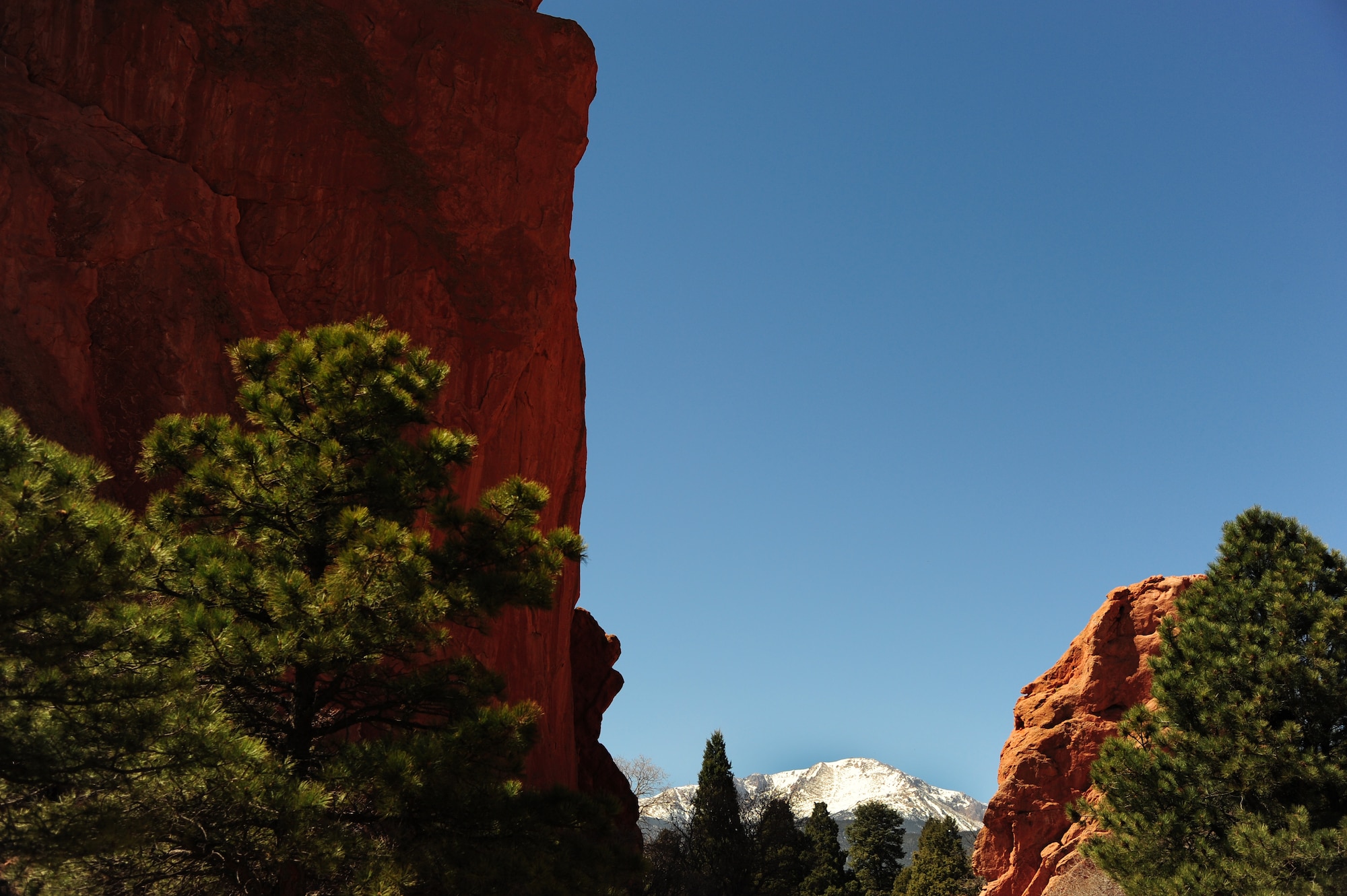 COLORADO SPRINGS, COLO.  – Pike’s Peak, known as America’s Mountain, is visible through the natural window between the rock formations known as the Twins in Colorado’s Garden of the Gods, April 7, 2016. Spanning 1,367 acres of terrain ranging from scrub lands to high tundra, the garden is one of the most heavily photographed sites in the local area. (U.S. Air Force photo/Staff Sgt. Amber Grimm)