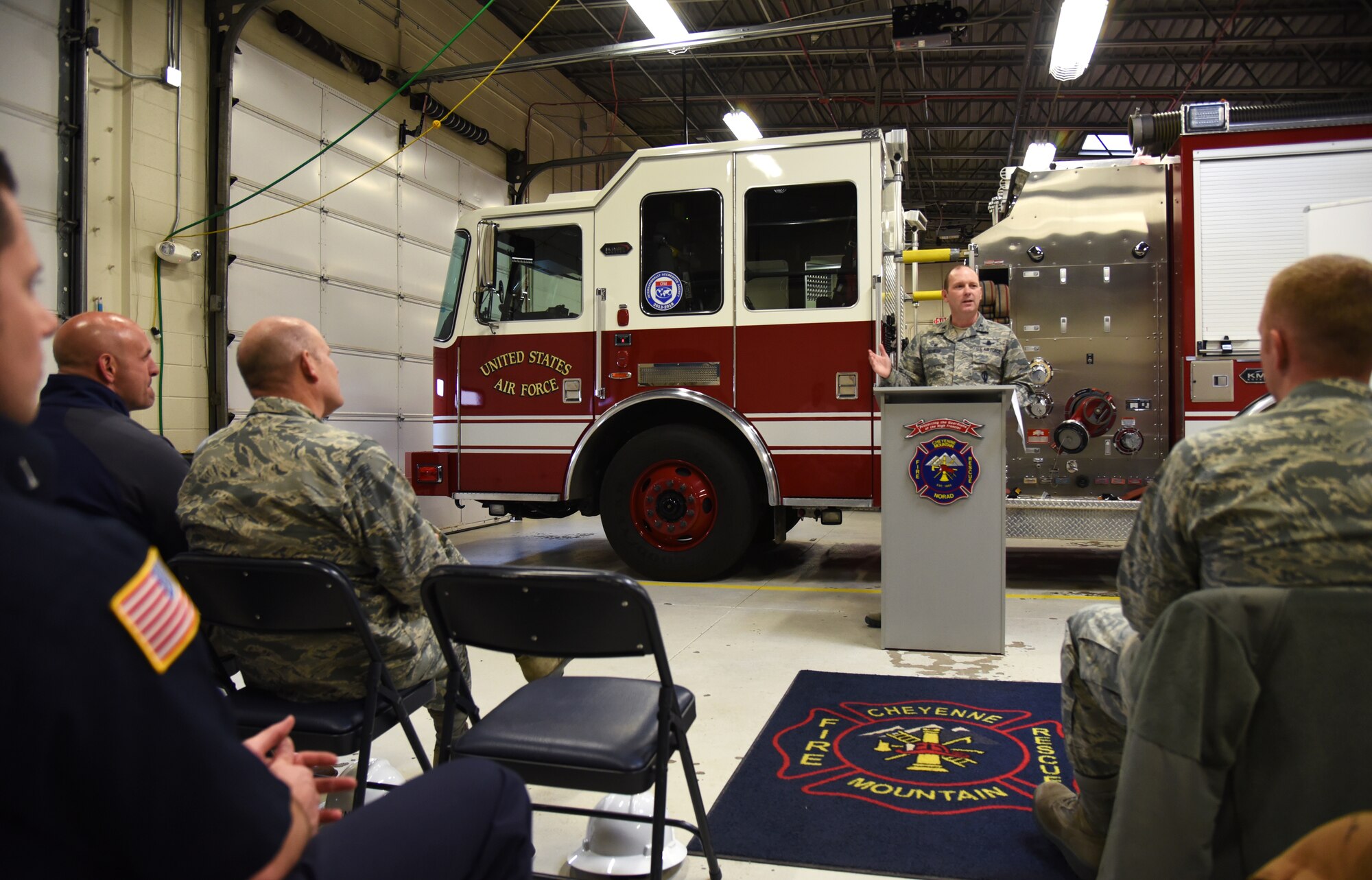 CHEYENNE MOUNTAIN AIR FORCE STATION, Colo. – Col. Doug Schiess, 21st Space Wing commander, addresses the Cheyenne Mountain Air Force State Fire Department Fire Station 2 April 28. The commander’s presentation highlights the station’s  new renovation project in order to maintain mission and community support capabilities. (U.S. Air Force photo/Airman 1st Class Dennis Hoffman)