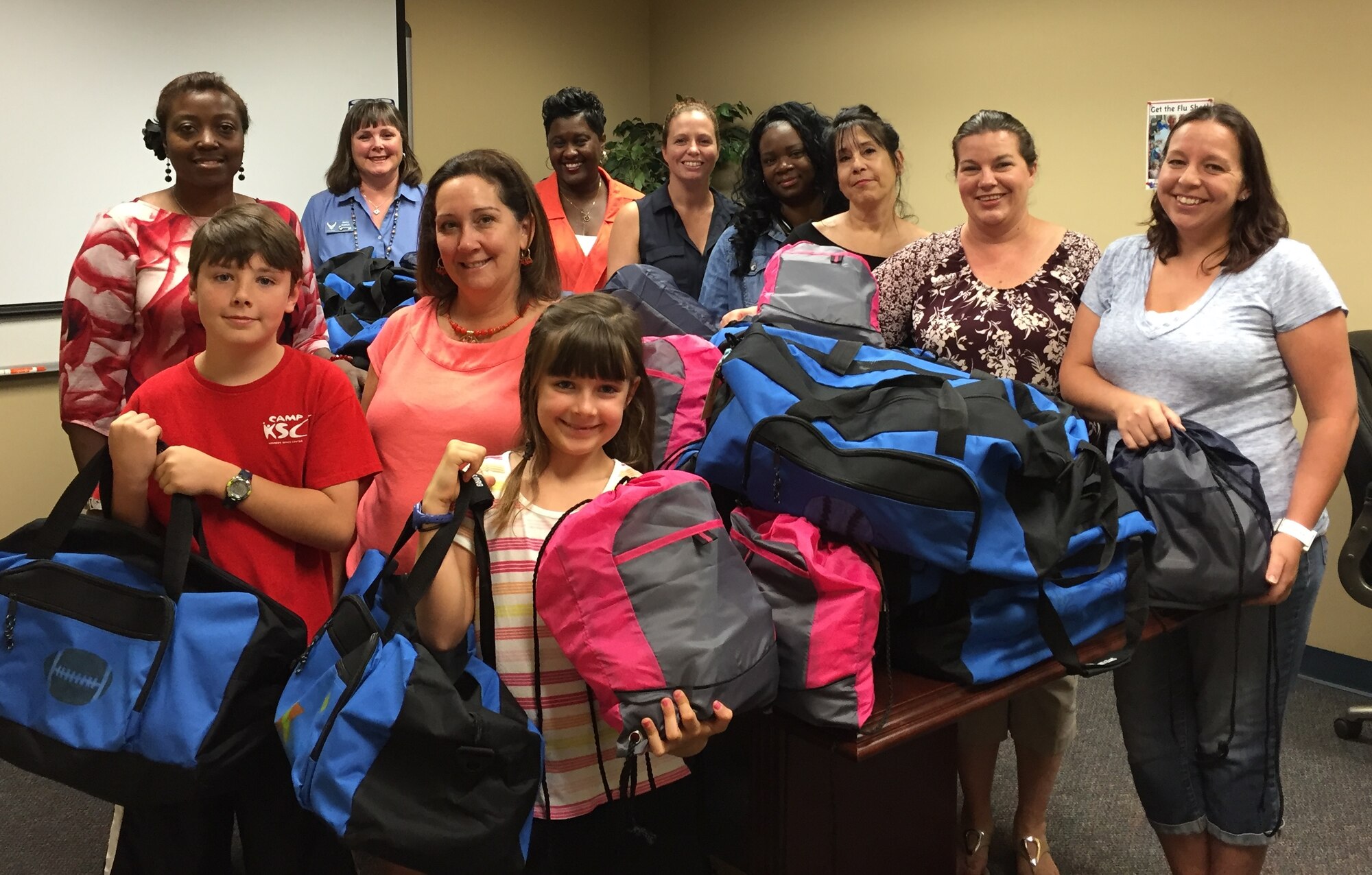 Patrick Air Force Base and Cape Canaveral Air Force Station key spouses drop off ‘Sweet Cases’ to Brevard Family Partnership April 19, 2016. The key spouses worked with Together We Rise over the past seven weeks to aid local foster children in transitioning to a new home. (Courtesy photo)
