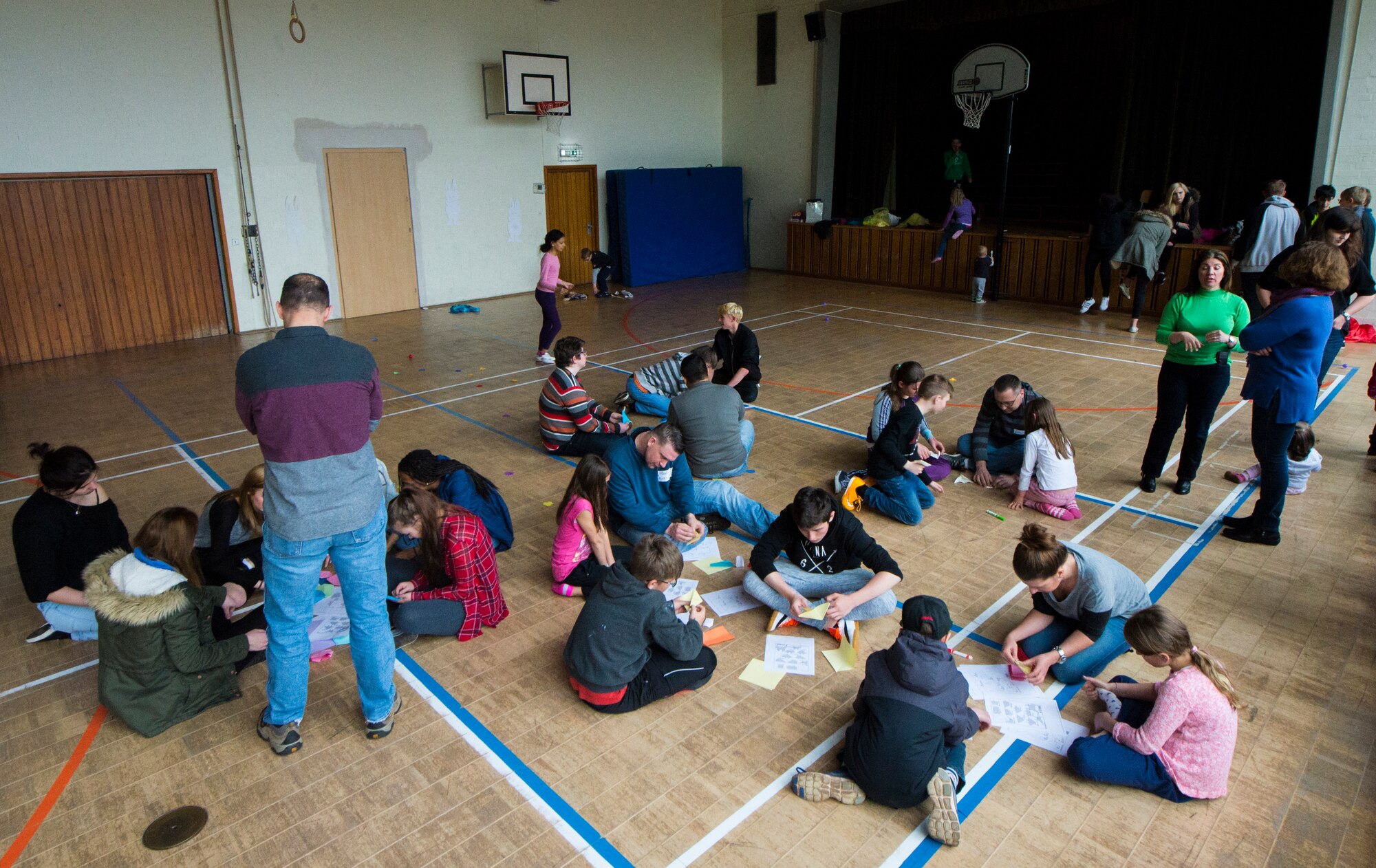 Children and Airmen from Ramstein Air Base, Germany, participate in various activities during a community engagement event April 23, 2016, at Landstuhl, Germany. More than 10 Airmen from Ramstein Air Base, Germany, participated in the event to build partnerships with the local community and improve rapport through interactive events and games. (U.S. Air Force photo/Senior Airman Jonathan Stefanko)