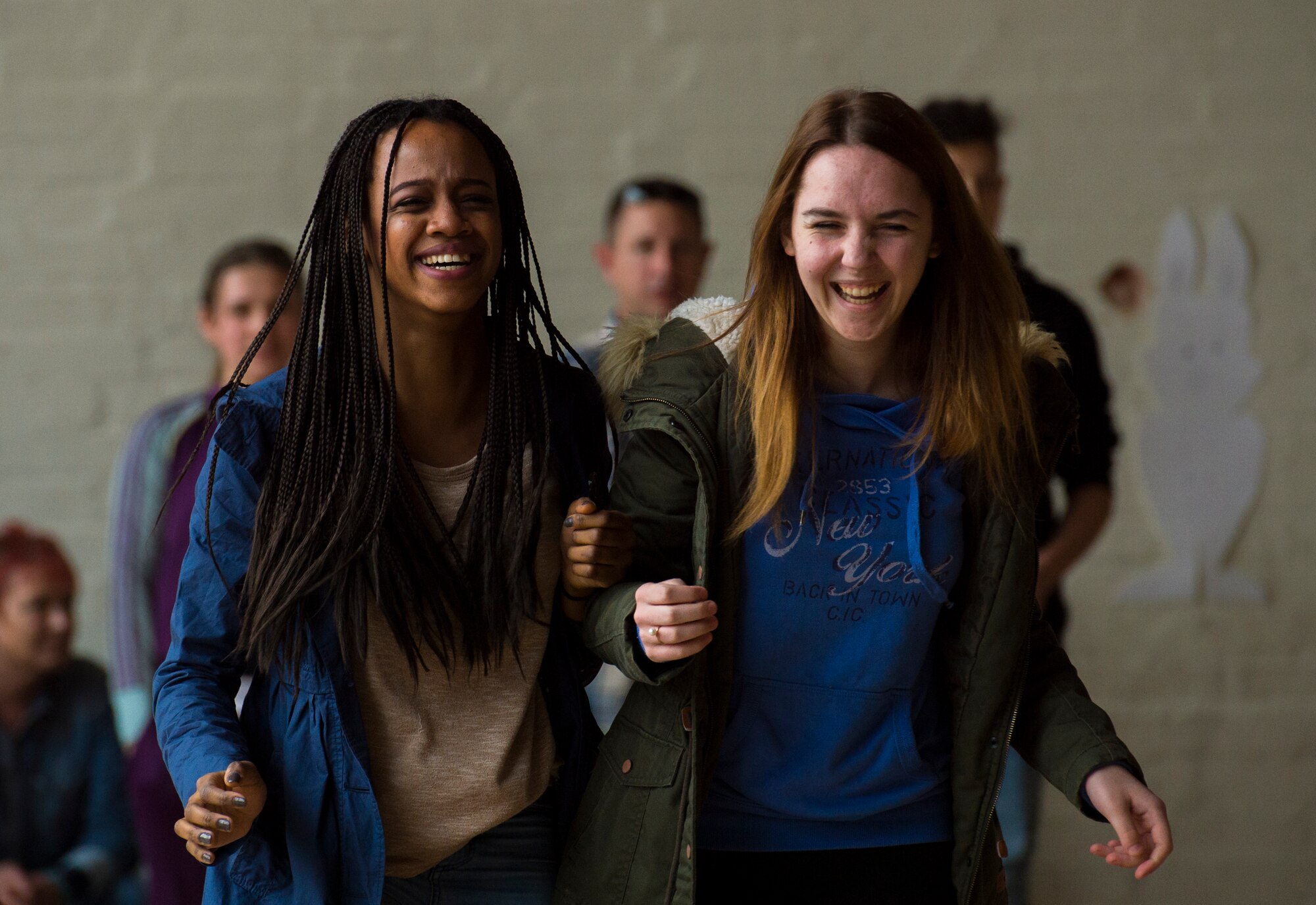 Nair, left, and Francesca, right, participate in a three-legged race during a community engagement event led by Airmen from Ramstein Air Base, Germany April 23, 2016, in Landstuhl, Germany. More than 10 Airmen participated in the event to build partnerships with the local community and improve rapport. (U.S. Air Force photo/Senior Airman Jonathan Stefanko)