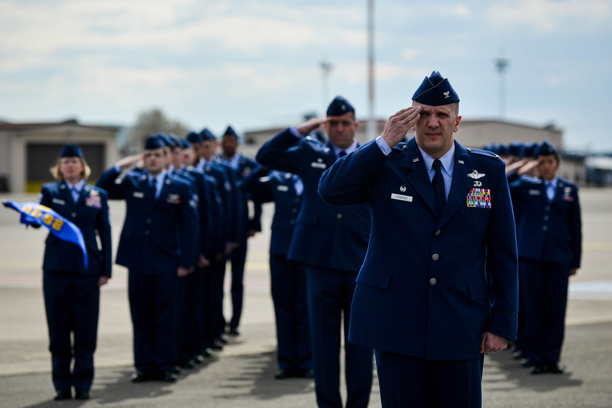 Col. Gerald A. Donohue, 86th Operations Group commander stands at the front of a formation April 29, 2016, at Ramstein Air Base, Germany.  Airmen from the 86th OG gathered for a retreat and remembrance ceremony to recognize the Implementation Force 21 crew from the 76th Airlift Squadron who gave the ultimate sacrifice 20 years ago when their aircraft was lost during an approach into Dubrovnik, Croatia. (U.S. Air Force photo/Senior Airman Nicole Keim) 