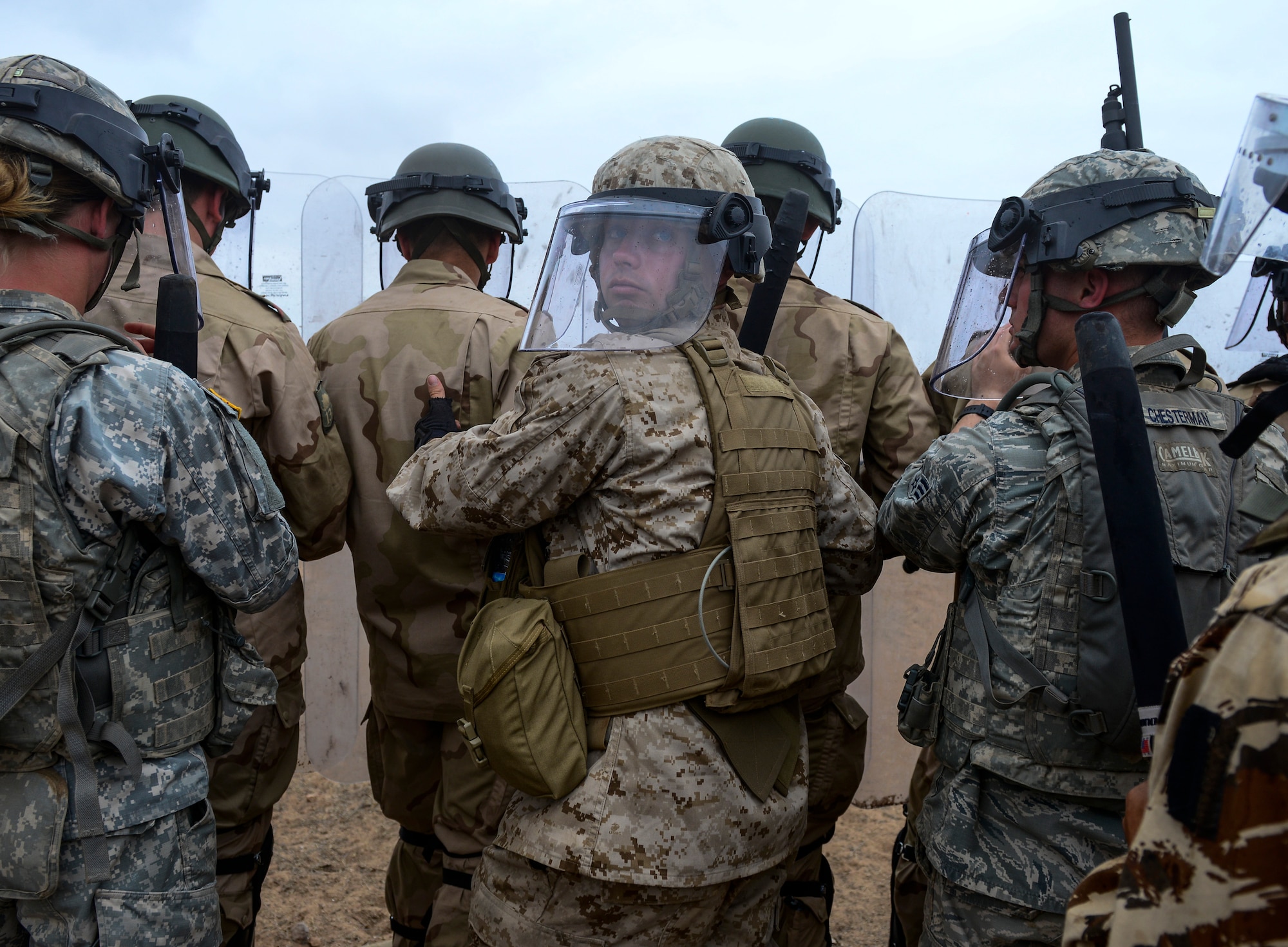 Military members from the U.S. Air Force, Marine Corps and Army; Royal Netherlands army and Royal Moroccan Armed Forces participate in a peace support operations demonstration during AFRICAN LION 16 at Tifnit, Kingdom of Morocco, April 26, 2016. The U.S. Marine Forces Europe-Africa and Kingdom of Morocco-led joint, combined exercise brought together 11 different countries to participate in a Combined Joint Task Force command post exercise and a peace support operations field training exercise to improve interoperability between countries. (U.S. Air Force photo by Senior Airman Krystal Ardrey/Released)