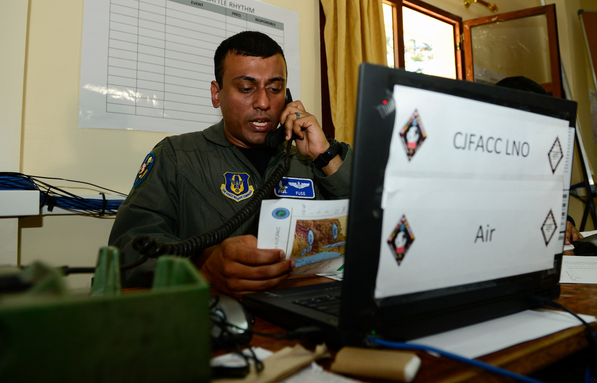 U.S. Air Force Maj. Sriram “Fuse” Krishnan, 414th Fighter Group exercise Joint Task Force air component liaison officer, works at his laptop during AFRICAN LION 16 at Inezgane, Kingdom of Morocco, April 23, 2016. Krishnan is an Air Force Reservist and the majority of the Air Force contingent, are Air Force Reservists or Air Guardsmen. 400 U.S. service members joined with over 350 personnel from 10 other countries to create a foundation for future partnerships and provide training to all nations on command post activities and peace support operations. (U.S. Air Force photo by Senior Airman Krystal Ardrey/Released)