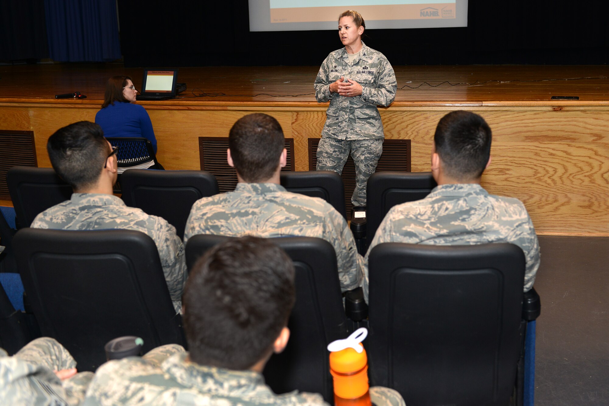 U.S. Air Force Col. Caroline M. Miller, commander of the 633rd Air Base Wing, speaks to Airmen from the 633rd Civil Engineer Squadron about the importance of safety during the unit’s participation in the OSHA National Safety Stand-Down day at Langley Air Force Base, Va., May 2, 2016. The stand-down included a showing of the 633rd Air Base Wing Safety Office’s fall protection video which won 1st place in the Air Force's Fall Protection Focus Weeks Video Challenge. (U.S. Air Force photo by Staff Sgt. Teresa J. Cleveland)