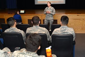 U.S. Air Force Col. Caroline M. Miller, commander of the 633rd Air Base Wing, speaks to Airmen from the 633rd Civil Engineer Squadron about the importance of safety during the unit’s participation in the OSHA National Safety Stand-Down day at Langley Air Force Base, Va., May 2, 2016. The stand-down included a showing of the 633rd Air Base Wing Safety Office’s fall protection video which won 1st place in the Air Force's Fall Protection Focus Weeks Video Challenge. (U.S. Air Force photo by Staff Sgt. Teresa J. Cleveland)