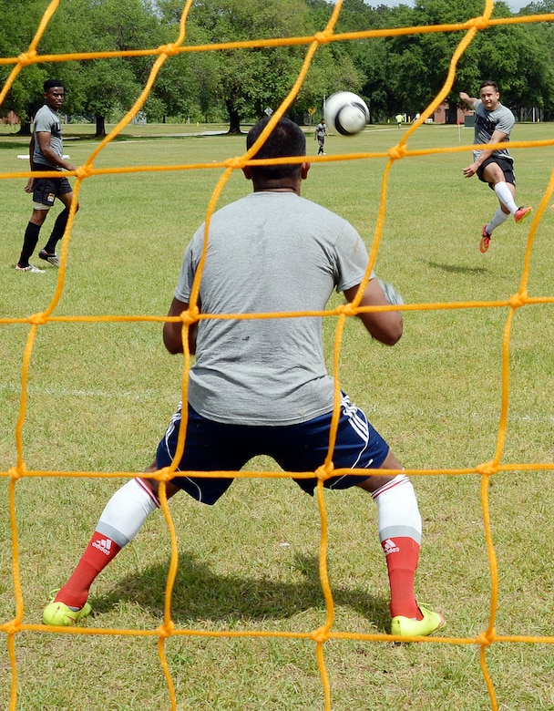Sgt. Glenn Duffy, team member, All-Marine Men’s Soccer Team, tries to score but is blocked by Sgt. Miguel Cebrero, goalie, during All-Marine Men’s Soccer Team tryouts aboard Marine Corps Logistics Base Albany, Ga., April 23. Duffy is an operations chief with The Basic School, Marine Corps Base Quantico, Va. Cebrero is a supply chief with 3rd Low Altitude Air Defense, Camp Pendleton, Calif.