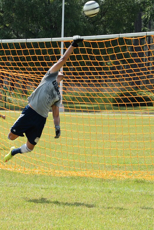 Staff Sgt. Rocky Fredin, goalie and team captain, All-Marine Men’s Soccer Team, blocks as shot during the All-Marine Men’s Soccer Team tryouts aboard Marine Corps Logistics Base Albany, Ga., April 26. Fredin, a native of Lawrenceville, Ga., has been nicknamed the ‘grand old man’ by his teammates because this is his sixth time being selected for the All-Marine Men’s Soccer Team.