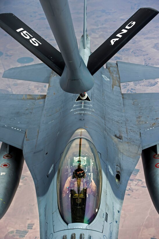 An Air Force F-16 Fighting Falcon supporting Operation Inherent Resolve receives fuel from a KC-135R Stratotanker aircraft over Iraq, April 29, 2016. Air Force photo by Staff Sgt. Douglas Ellis