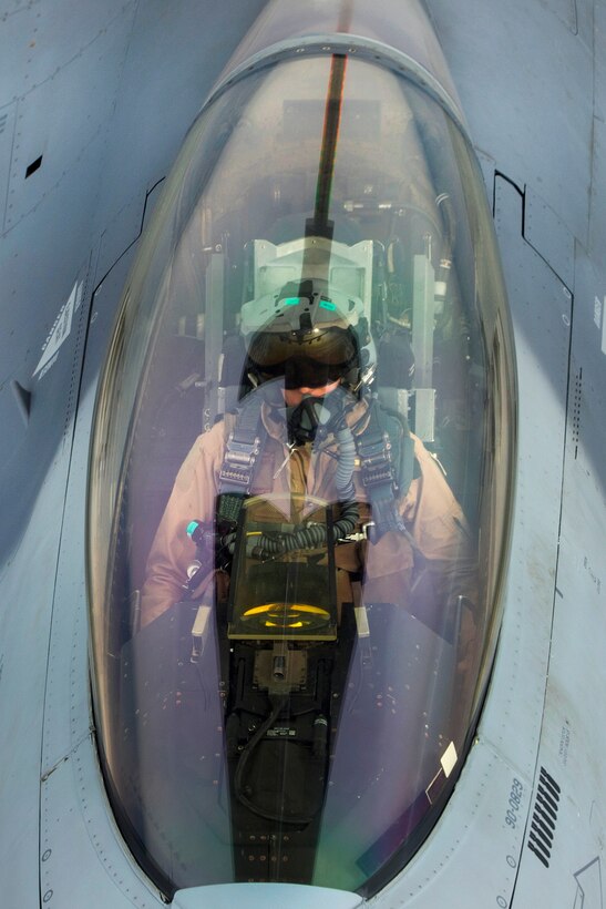 An Air Force F-16 Fighting Falcon pilot communicates with a KC-135R Stratotanker boom operator over Iraq while supporting Operation Inherent Resolve, April 29, 2016. Air Force photo by Staff Sgt. Douglas Ellis