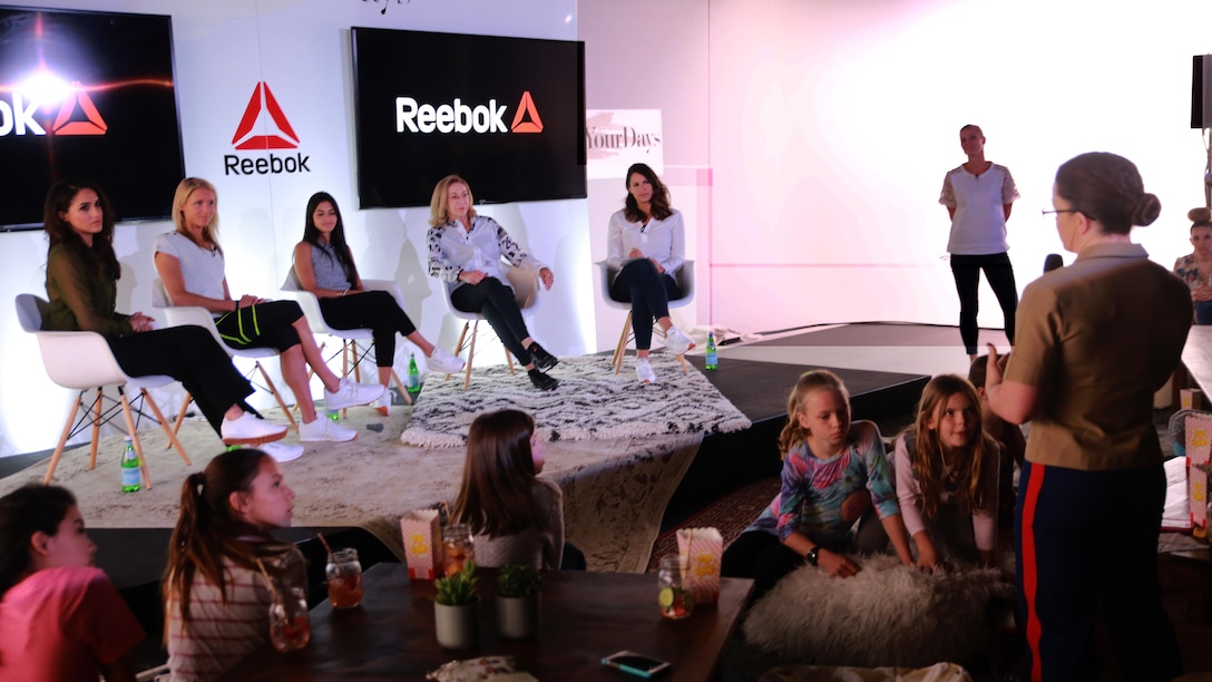 Major Misty Posey speaks to a panel of women at the Reebok Headquarters' Honor Your Days event in Canton, Massachusetts, April 28, 2016. Posey was invited to the event due to her hardwork and dedication to the Corps, and to show young women that they can achieve their dreams. Posey spoke the the panelists and attendees about her dream to help women train to do pull-ups, and told them that anything is possible if they set their heart and mind to it. She hopes to spread the word about her pull-up program to help men and women across the nation.
