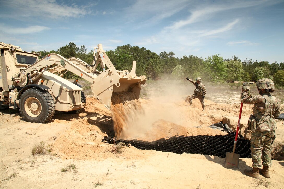 Paratroopers fill a sand crater during an airfield damage repair training exercise at Fort Bragg, N.C., April 27, 2016. Army photos by Sgt. Juan F. Jimenez