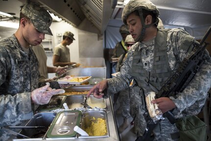 U.S. Army Reserve field cooks from the 490th Quartermaster Company, of Rochester, New York, serve breakfast to fellow Soldiers in the field at Forward Operating Base Schoonover at Fort Hunter-Liggett, California, May 3. Approximately 80 units from across the U.S. Army Reserve, Army National Guard and active Army are participating in the 84th Training Command's second Warrior Exercise this year, WAREX 91-16-02, hosted by the 91st Training Division at Fort Hunter-Liggett, California. (U.S. Army photo by Master Sgt. Michel Sauret)