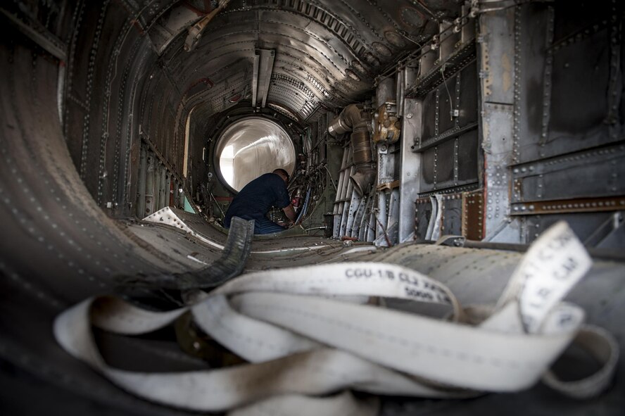 A U.S. Air Force Airman from the 23d Equipment Maintenance Squadron disassembles an F-4 Phantom II, April 28, 2016, at Moody Air Force Base, Ga. Once transported, the F-4 will sit as a static display in the Veteran’s Memorial Park in Excel, Ala. (U.S. Air Force photo by Airman 1st Class Lauren M. Hunter/Released)