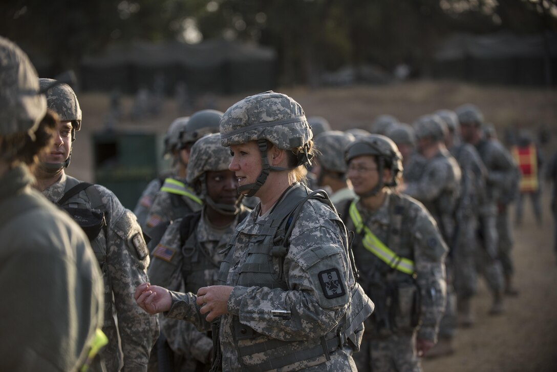 U.S. Army Reserve and National Guard Soldiers line up to eat breakfast in the field at Forward Operating Base Schoonover at Fort Hunter-Liggett, California, May 3. Approximately 80 units from across the U.S. Army Reserve, Army National Guard and active Army are participating in the 84th Training Command's second Warrior Exercise this year, WAREX 91-16-02, hosted by the 91st Training Division at Fort Hunter-Liggett, California. (U.S. Army photo by Master Sgt. Michel Sauret)