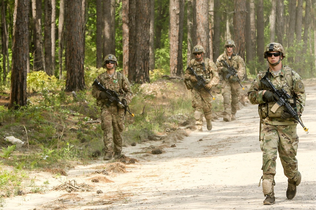Paratroopers participate in a tactical patrol as part of a training exercise to repair damaged airfields at Fort Bragg, N.C., April 27, 2016. Army photo by Sgt. Juan F. Jimenez