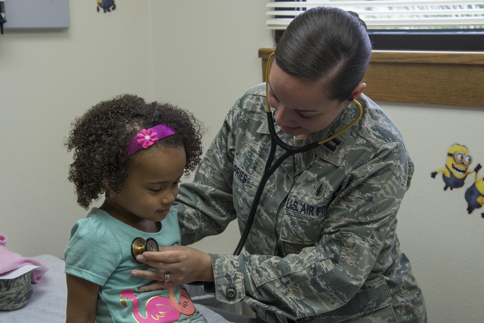 Capt. Nichole Pries, 359th Medical Operations Squadron nurse practitioner, performs a check up at the Joint Base San Antonio (JBSA) - Randolph Medical Clinic, May 2, 2016. The 359th MDOS is a part of the 359th Medical Group at JBSA-Randolph that  provides comprehensive medical and dental care, physiological training, health promotion and occupational public health support to JBSA-Randolph units and a beneficiary population of 54,000. (U.S. Air Force photo by Senior Airman Stormy Archer/Released)