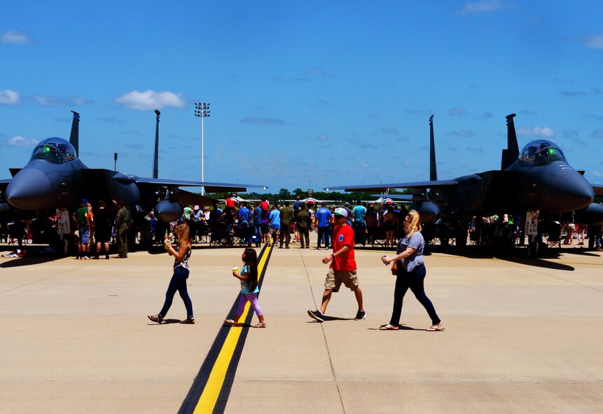 Families and friends enjoy the 2016 Defenders of Liberty Airshow at Barksdale Air Force Base, La., April 30. The air show boasted a variety of aircraft performances and displays as well as inflatables for children. (U.S. Air Force photo/Airman 1st Class Luke Hill)