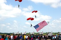 Members of the Canadian Forces SkyHawks descend from the sky during the 2016 Defenders of Liberty Airshow at Barksdale Air Force Base, La., May 1. The team takes great pride in showcasing the professionalism, dedication and teamwork it takes to be part of Canada’s military. (U.S. Air Force photo/Airman 1st Class Curt Beach)