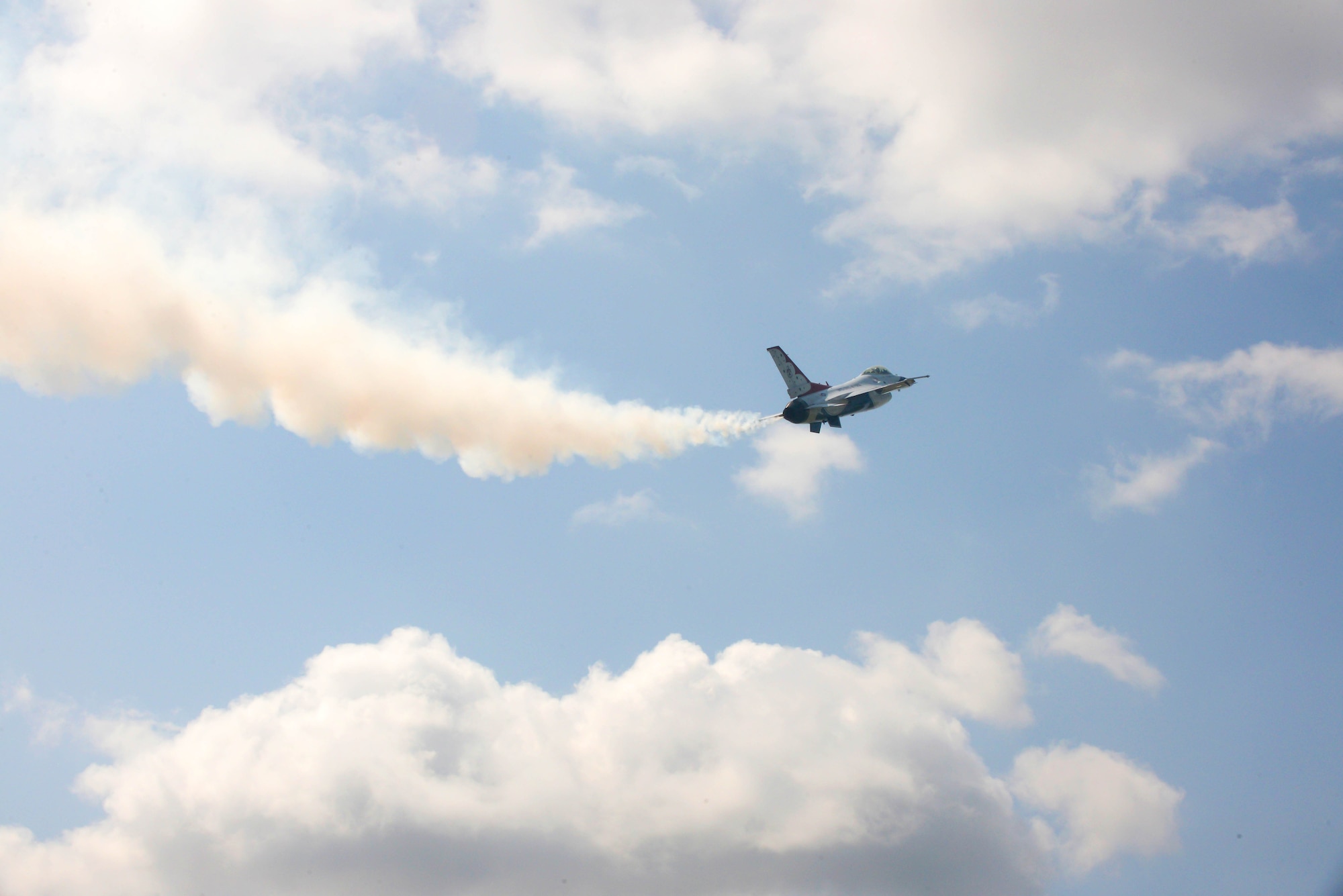 A U.S. Air Force Thunderbird soars through the sky during the 2016 Defenders of Liberty Airshow at Barksdale Air Force Base, La., May 1. The mission of the Thunderbirds is to plan and present precision aerial maneuvers to exhibit the capabilities of modern high performance aircraft and the high degree of professional skill required to operate such aircraft.
 (U.S. Air Force photo/Airman 1st Class Curt Beach)
