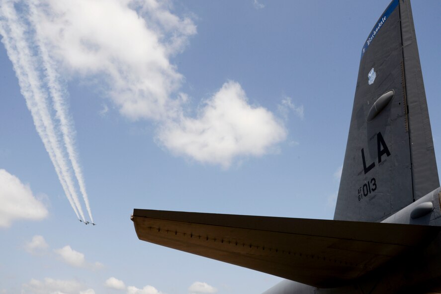 U.S. Air Force Thunderbirds demonstrate precision flying during the 2016 Defenders of Liberty Airshow at Barksdale Air Force Base, La., May 1. The Thunderbirds’ demonstration consisted of many formation and solo flying routines including the calypso pass, reflection pass, arrowhead loop, cross over break, delta burst, diamond opener, high bomb burst and inverted opposing knife edge. (U.S. Air Force photo/Senior Airman Amanda Morris)