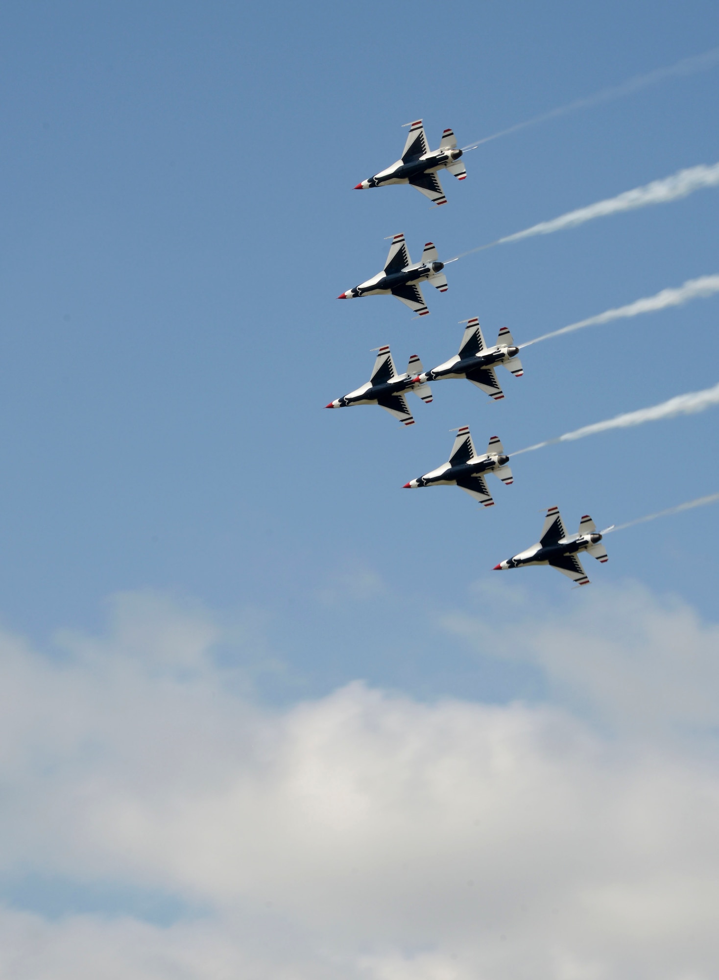 U.S. Air Force Thunderbirds demonstrate precision flying during the 2016 Defenders of Liberty Airshow at Barksdale Air Force Base, La., May 1. The Thunderbirds performed twists, turns and rolls at high speeds demonstrating the prowess and capabilities of the F-16 Fighting Falcon. (U.S. Air Force photo/Senior Airman Amanda Morris)