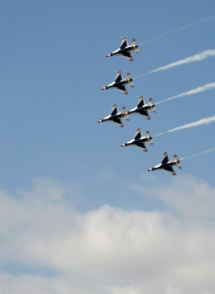 U.S. Air Force Thunderbirds demonstrate precision flying during the 2016 Defenders of Liberty Airshow at Barksdale Air Force Base, La., May 1. The Thunderbirds performed twists, turns and rolls at high speeds demonstrating the prowess and capabilities of the F-16 Fighting Falcon. (U.S. Air Force photo/Senior Airman Amanda Morris)