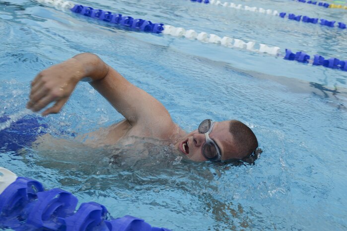 Staff Sgt. Andrew Bergdorf, 9th Civil Engineer Squadron power production supervisor, takes a breath as he swims in the pool at the Gauche Aquatics Park in Yuba City, California, April 21, 2016. Bergdorf has been selected to compete in the Department of Defense Wounded Warrior Games which will take place at the U.S. Military Academy in West Point, New York, June 14-22, 2016. (U.S. Air Force photo by Senior Airman Michael J. Hunsaker)