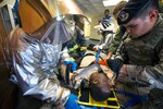 U.S. Air Force emergency responders treat a simulated casualty during an active shooter exercise May 4, 2016, at Kadena Air Base, Japan. The scenario acted as a training tool for participants, giving them insight into a potential real-world active shooter situation in the future. 